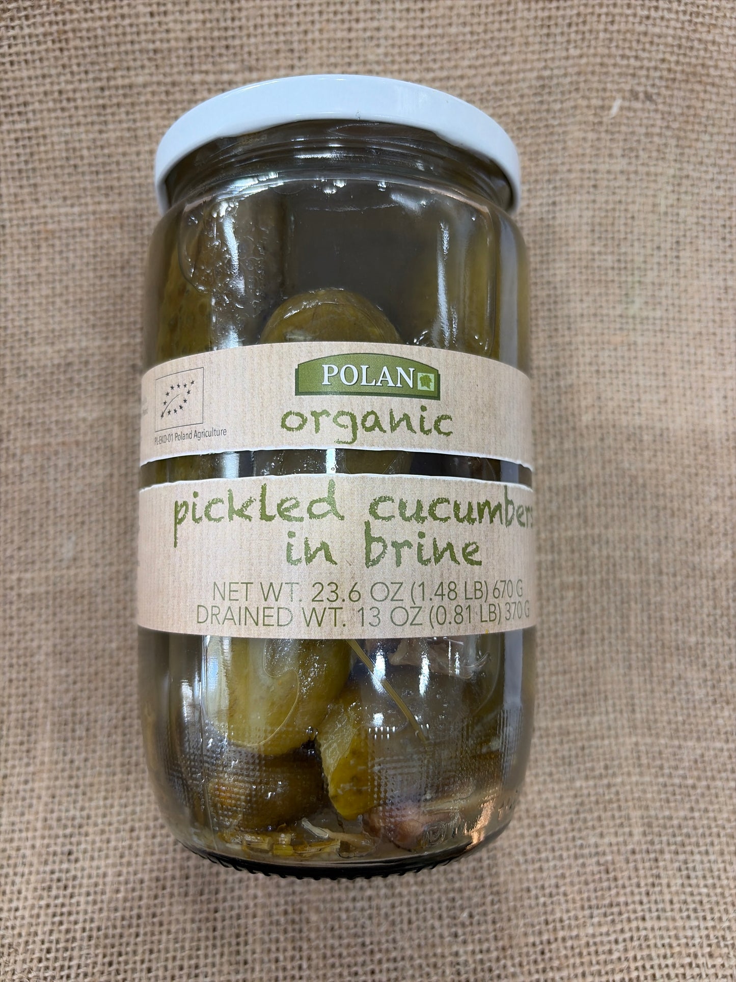 Organic pickled cucumber in brine